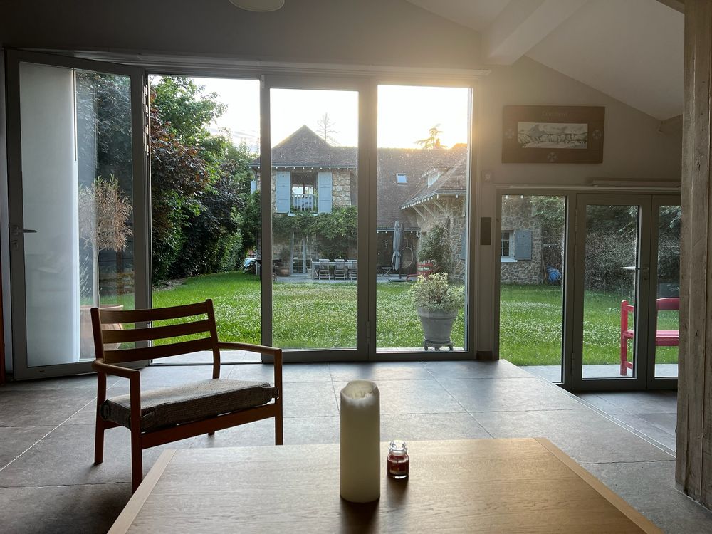View from the guest cottage across the lawn to the main house