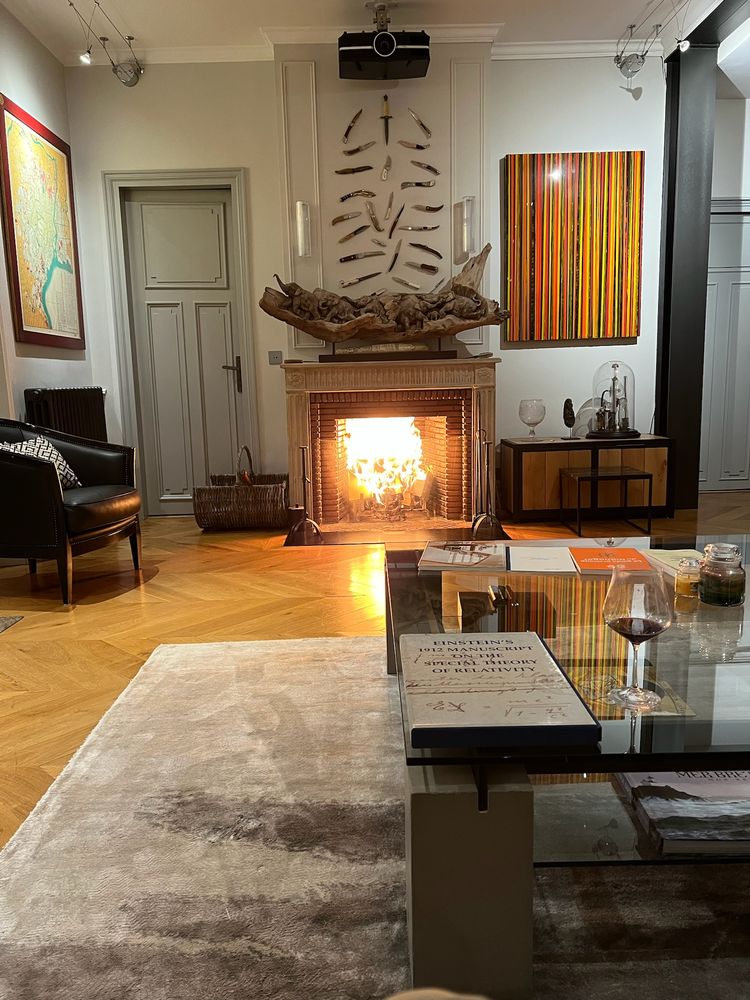 A fire burning in the living room fireplace