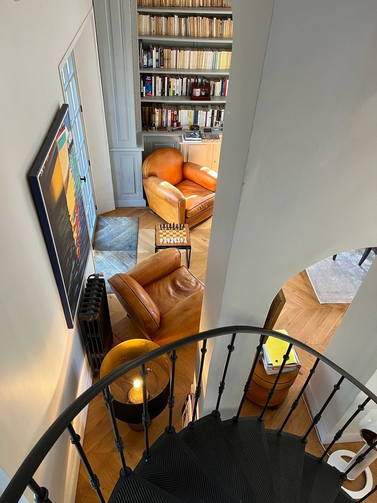 View down the spiral staircase into the reading corner